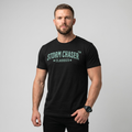 Man wearing a black t-shirt with 'STORM CHASER CLASSICS' 